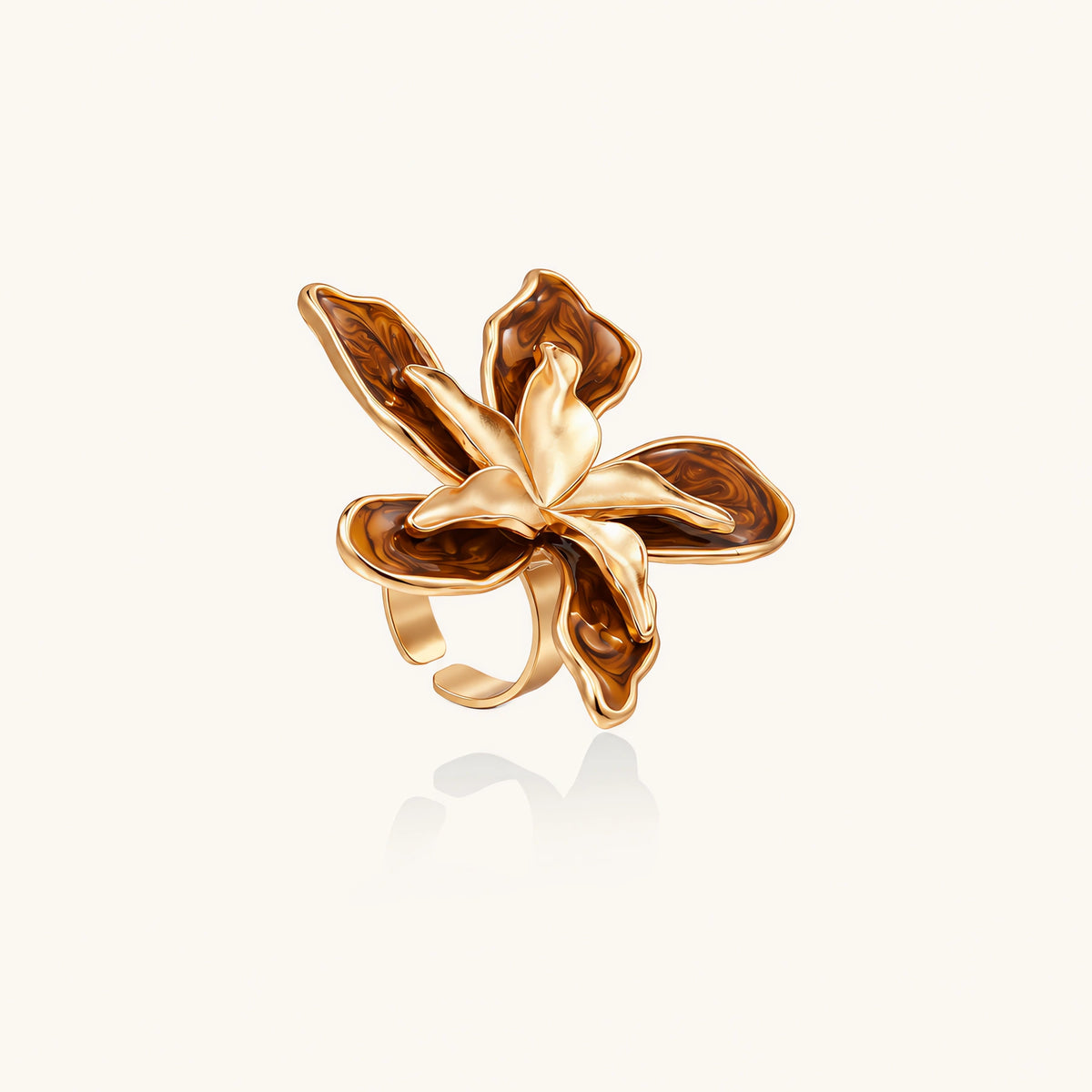 Large rose gold ring with marbled brown enamel petals in a sculptural flower design