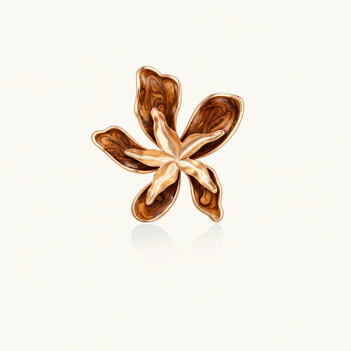 Large rose gold ring with marbled brown enamel petals in a sculptural flower design