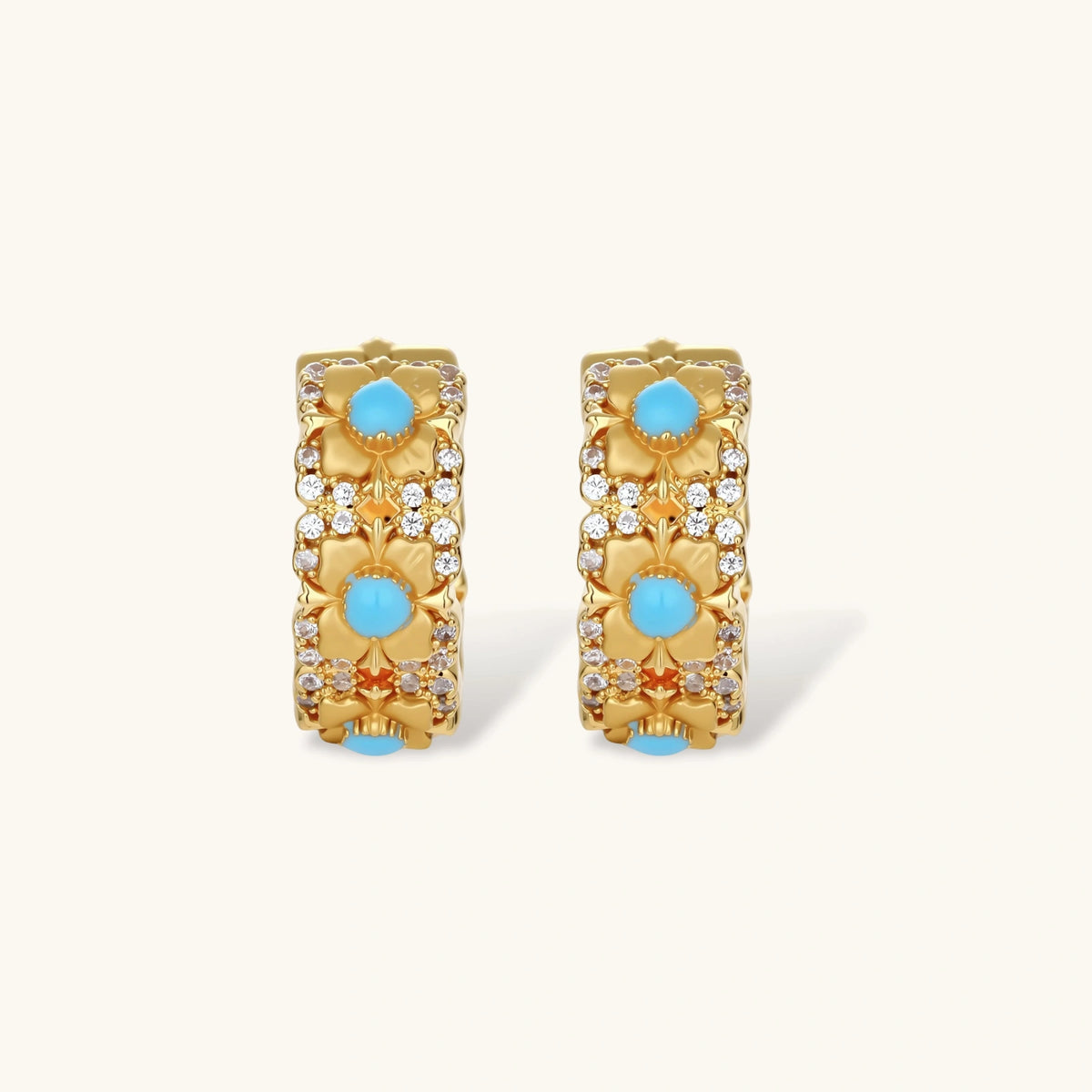 18K gold-plated hoop earrings with turquoise-centered flowers and crystal details on white background.